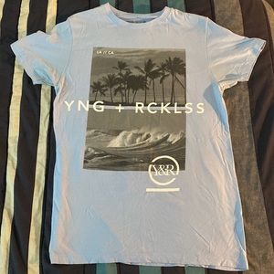 Young and Reckless Light Blue T Shirt. Size: Medium (M)